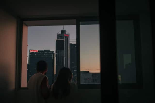 Windows open with city skyscrapers in view in Sydney